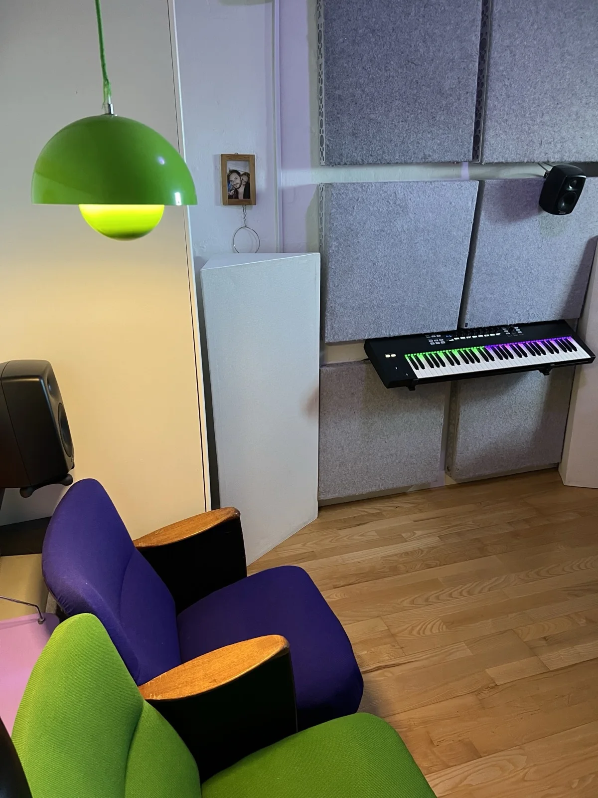 Detail with acoustic panels, keyboard and side listening zone in Julius Sylvest's studio